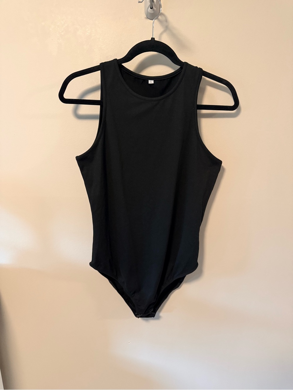 Black Sleeveless One-Piece Bodysuit